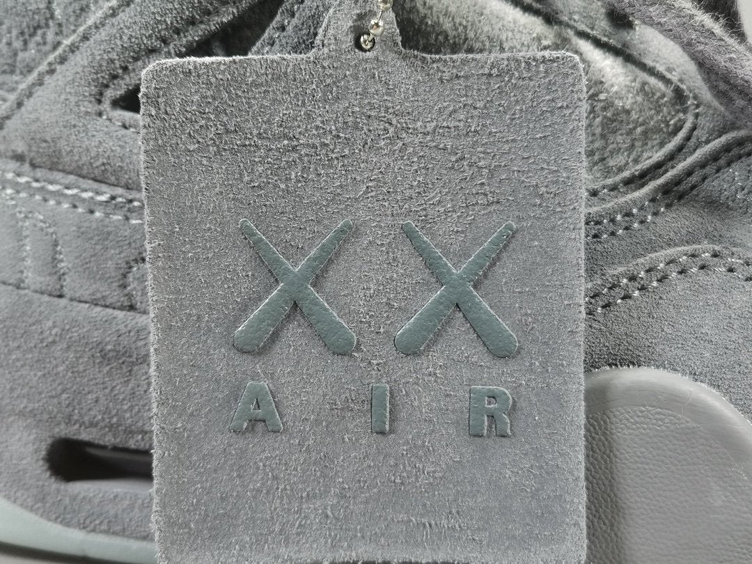 JORDAN 4 x KAWS GRIS